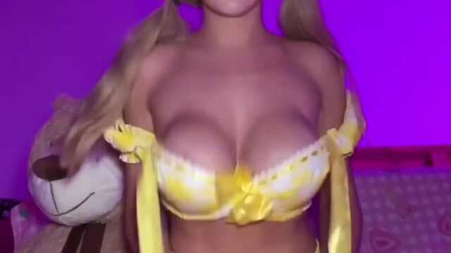 DanyanCat onlyfans in a sexy yellow lingerie shaking her big tits