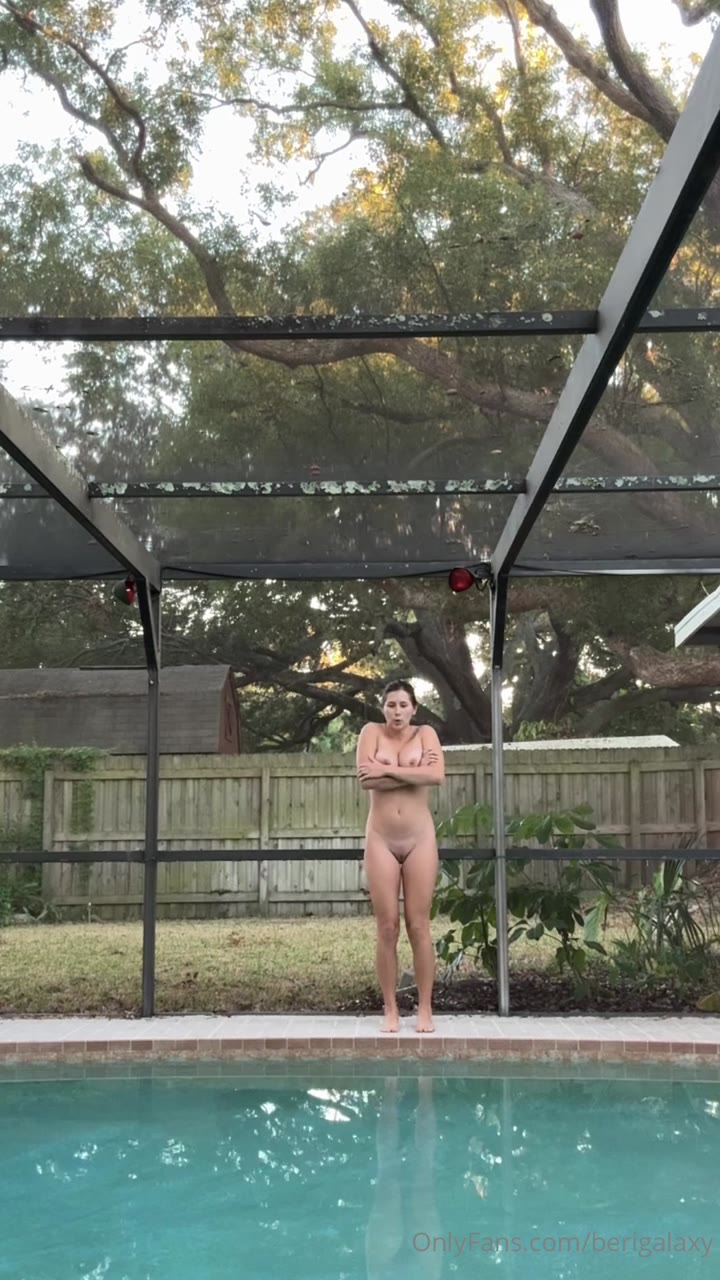 naked Berigalaxy jumping in the pool